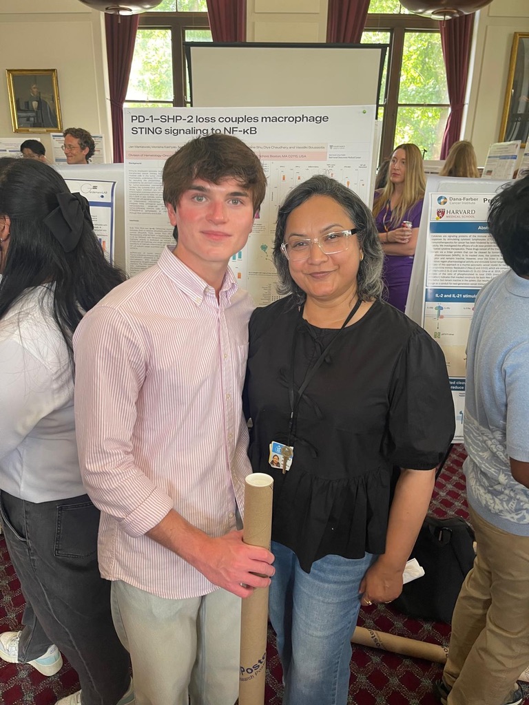 with a mentor at the poster session